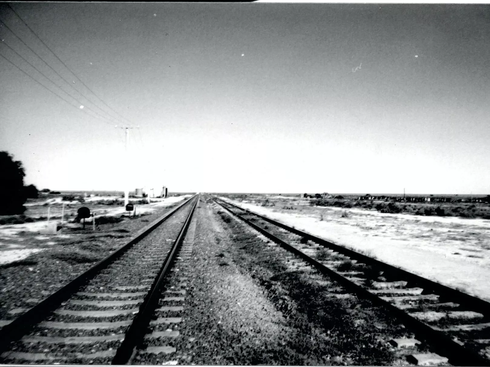 Train tracks run through the desert in Cook, Australia