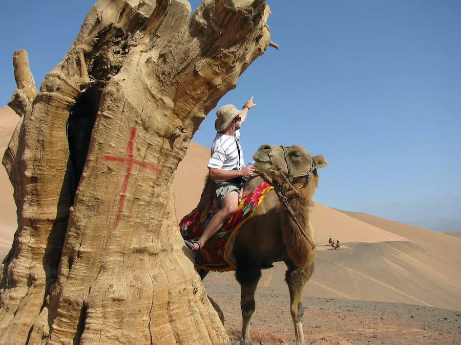 Riding a camel in the Gobi